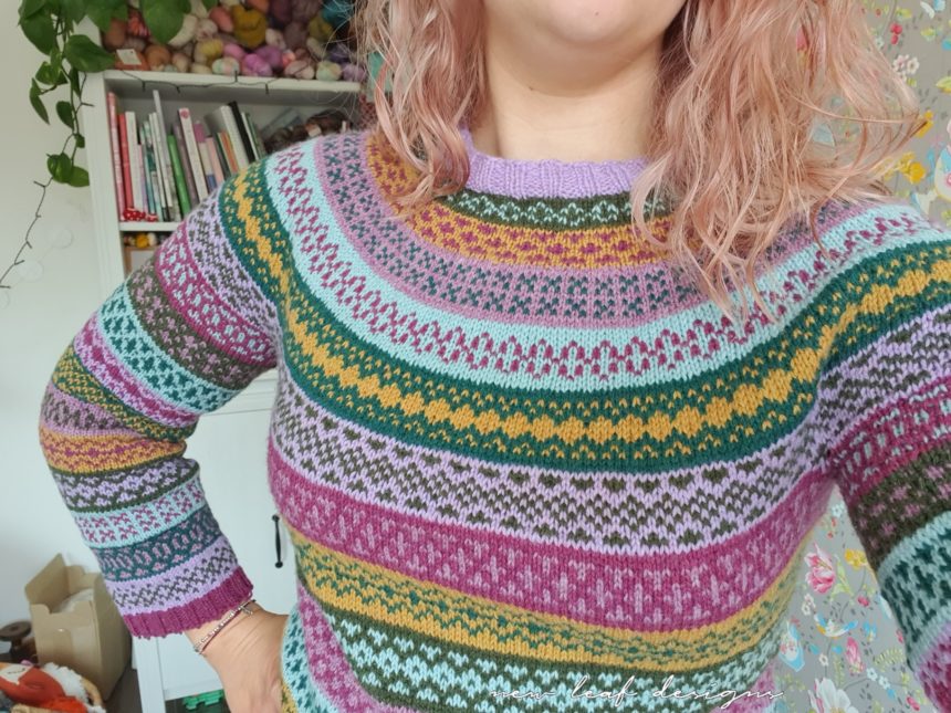 person wearing colourwork sweater