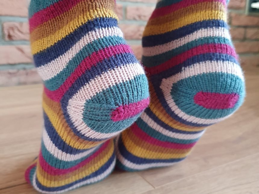 close up of the afterthought heels of a pair of socks, showing bulls eye striping effect